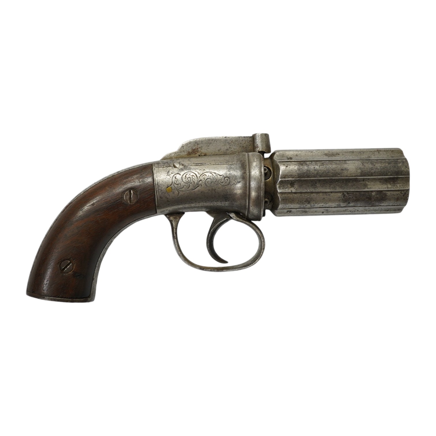 A six shot self-cocking percussion pepper box revolver, with fluted barrels, Birmingham proofed, round frame, and scroll engraved wooden grips, barrel 6.5cm. Condition - fair, alterations to the frame and grip.